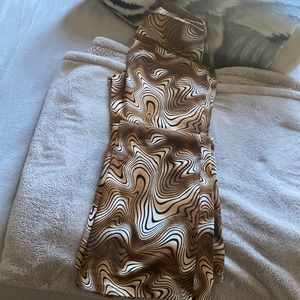 Brown and white zebra printed flared leggings